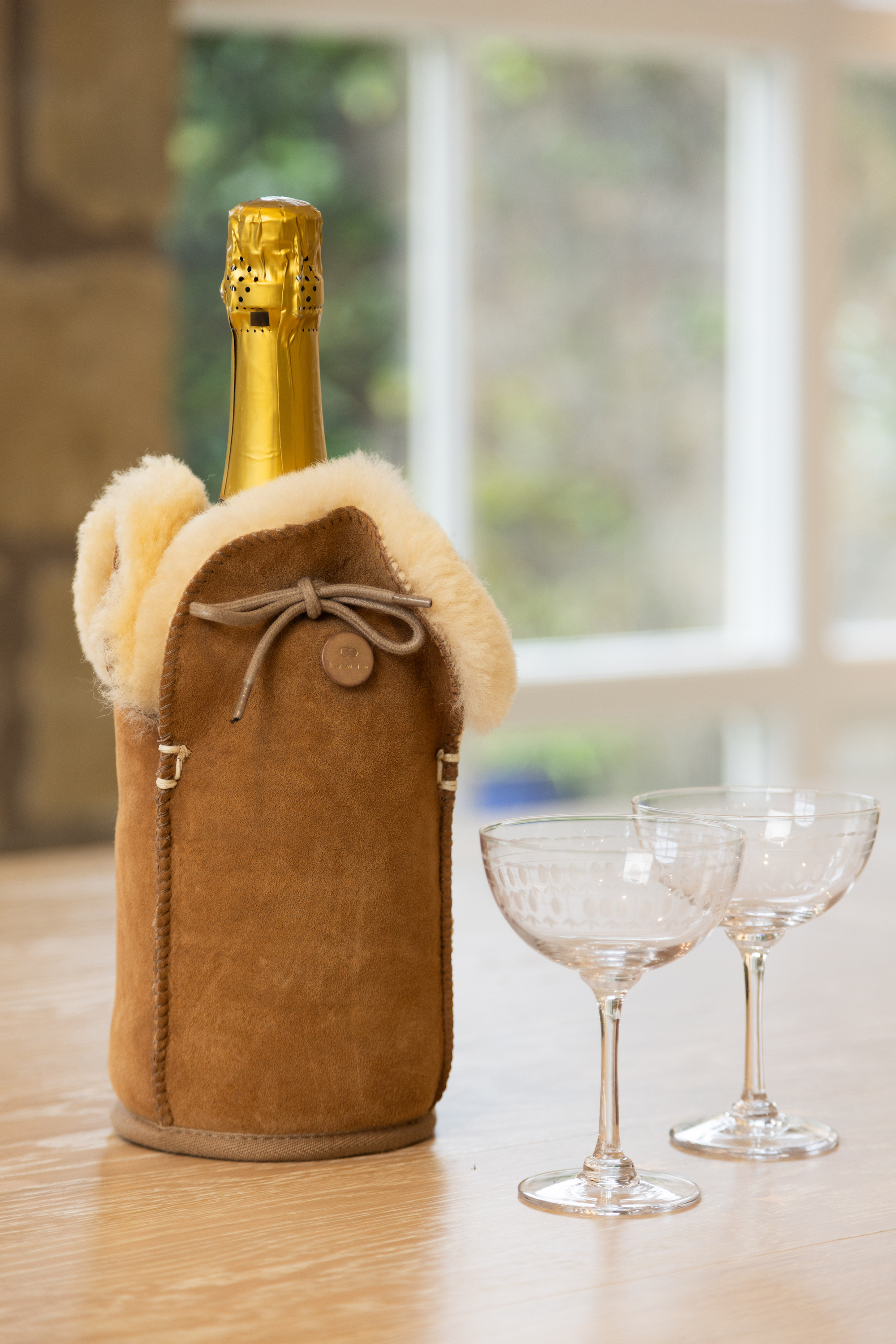 Chocolate sheep skin bottle cooler