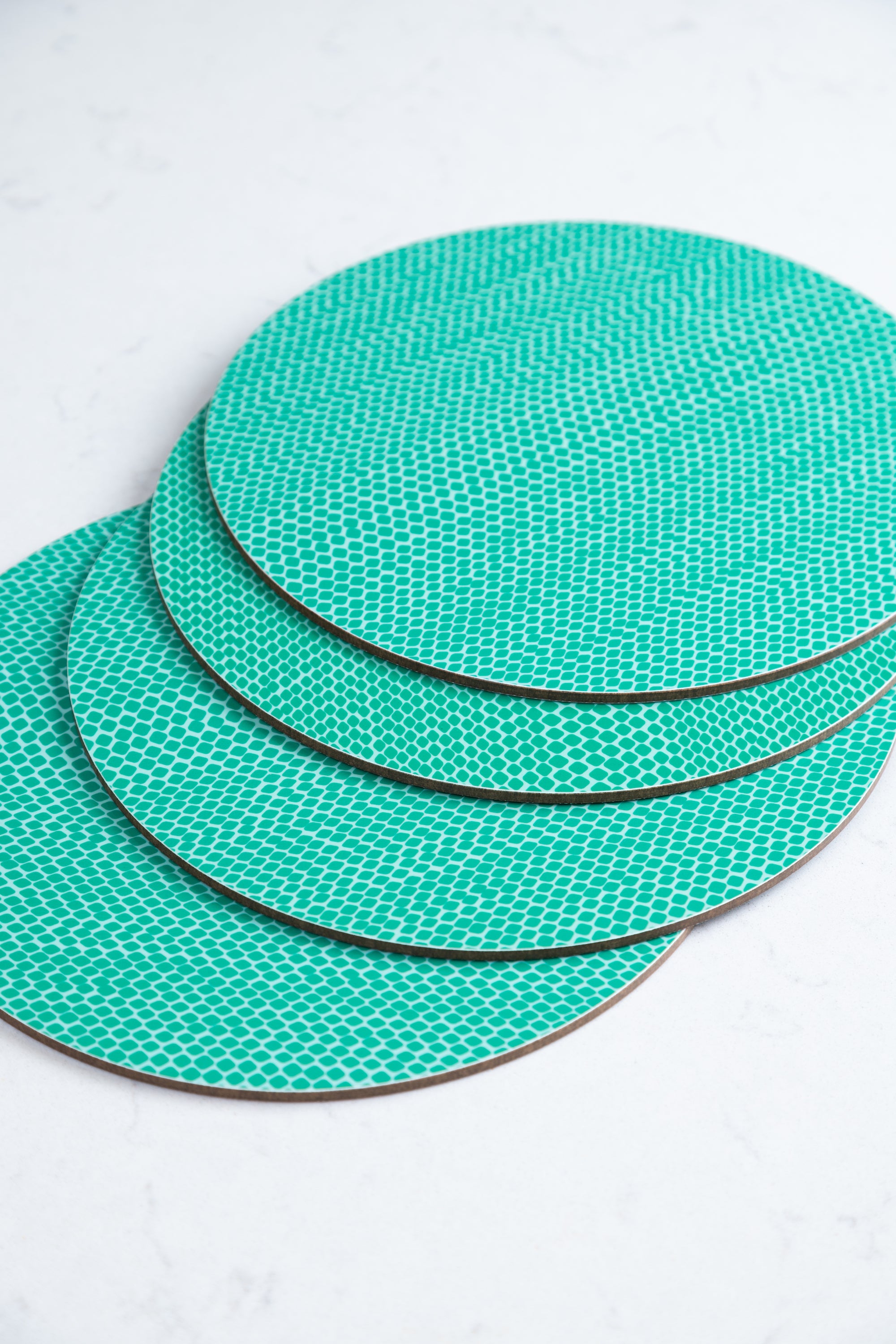 Set of 4 Snake print placemats in jade green