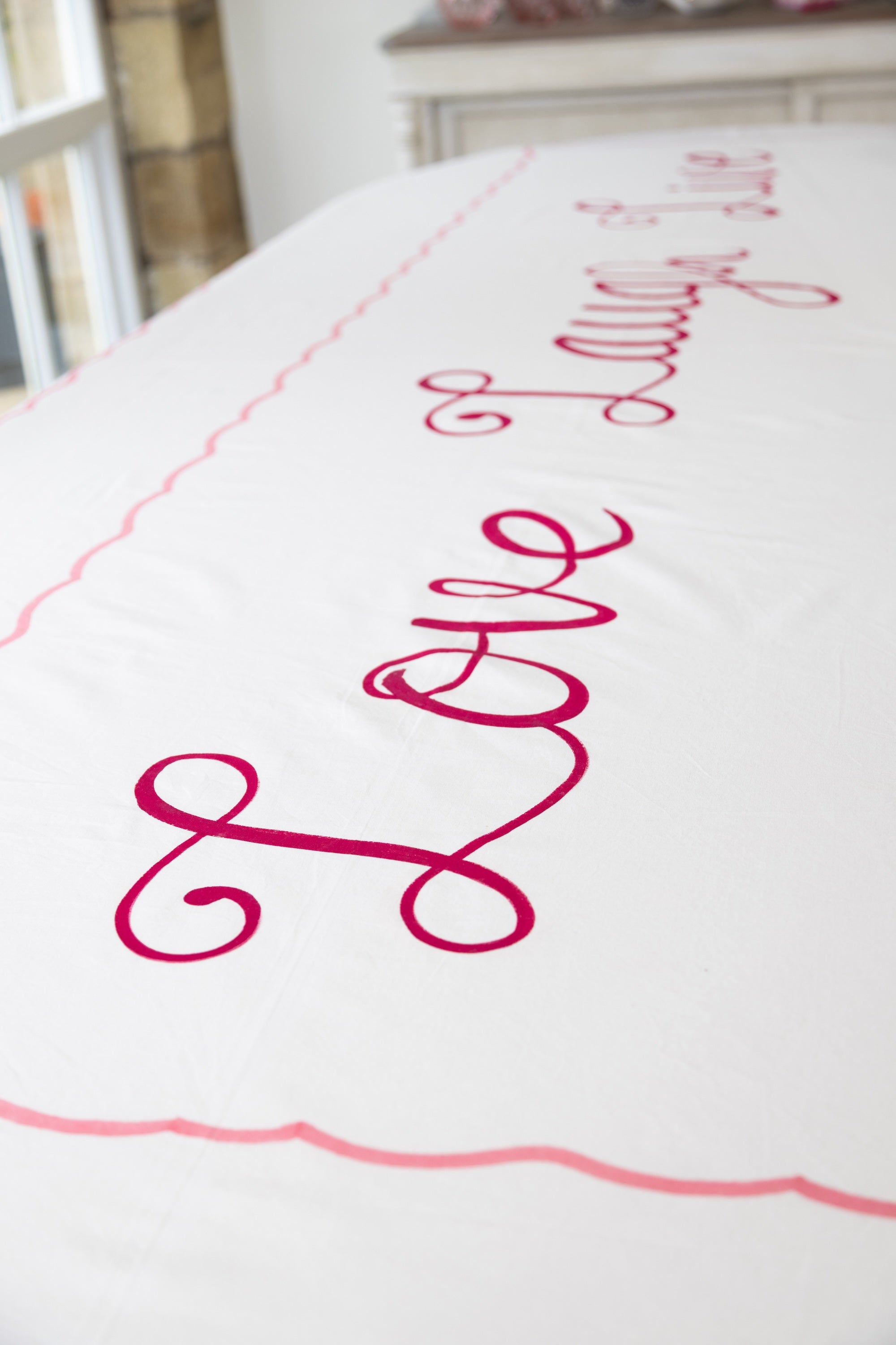 Close up of handpainted table cloth