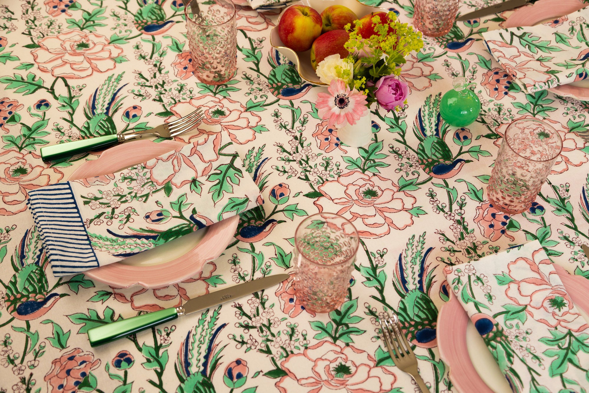 Pink, green and blue tablecloth and napkins
