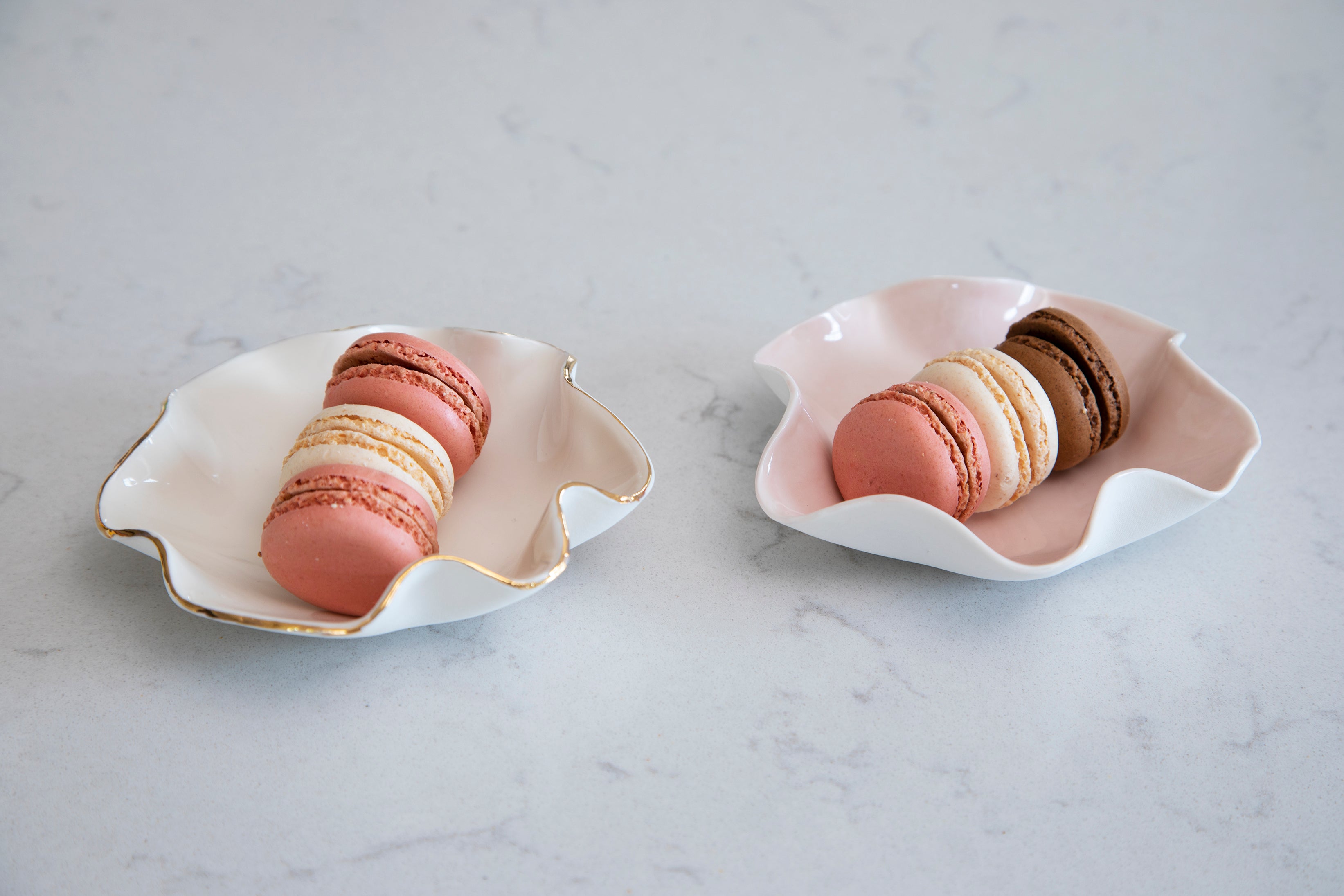 white and pink wave bowls