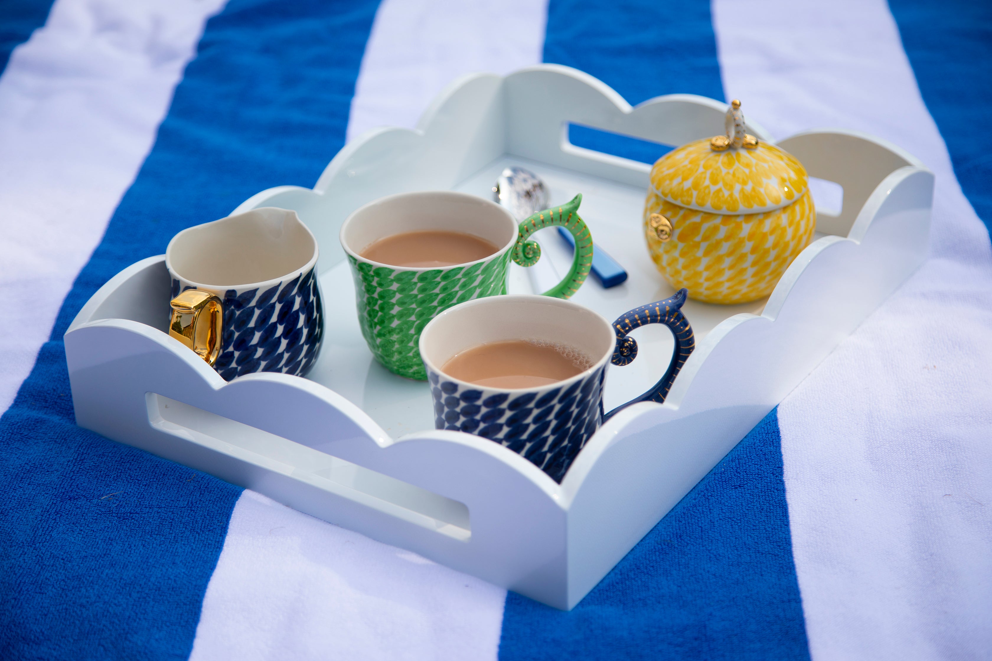 Miranda Berrow Tea cups, milk jug and sugar bowl on a white  Addison Rosstray