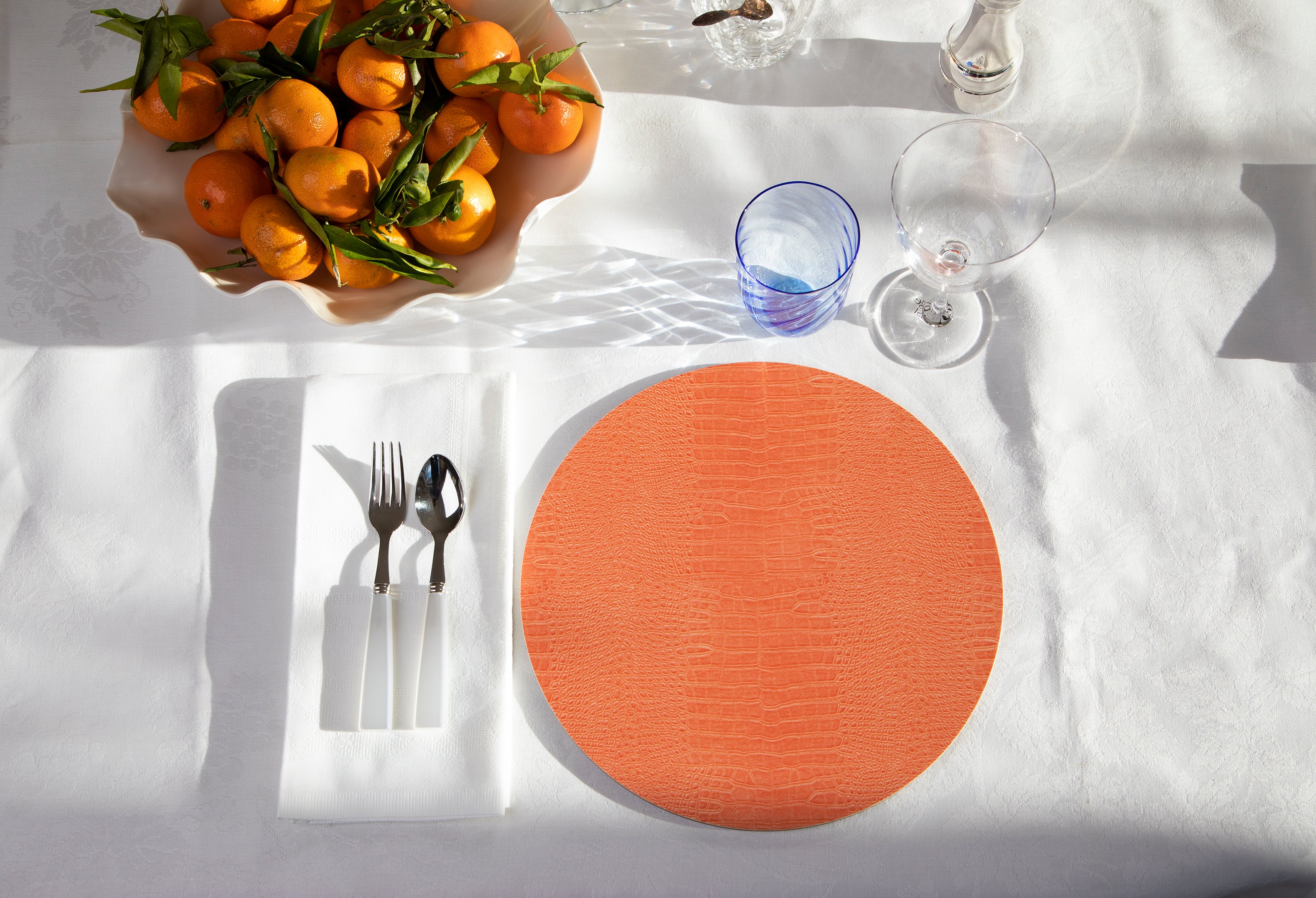 Orange crocodile print round placemat