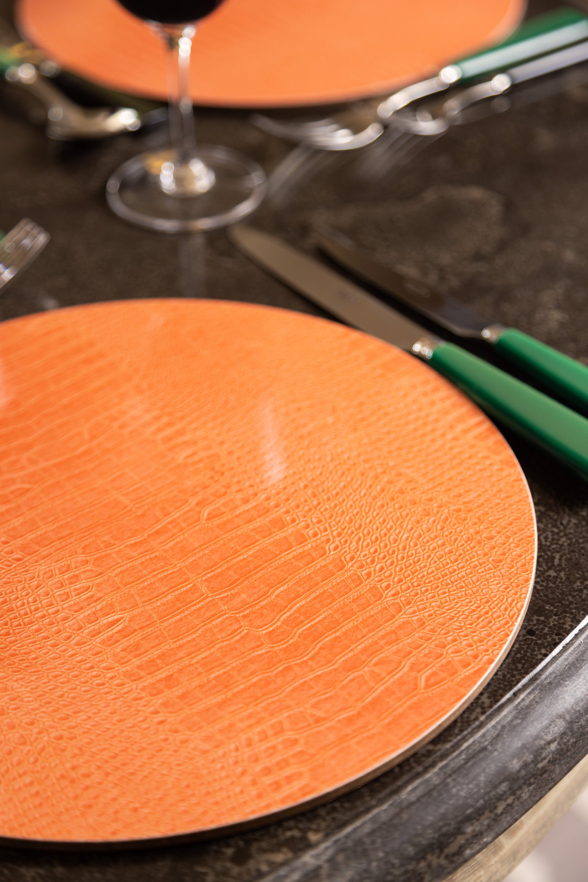 Orange crocodile print round placemat