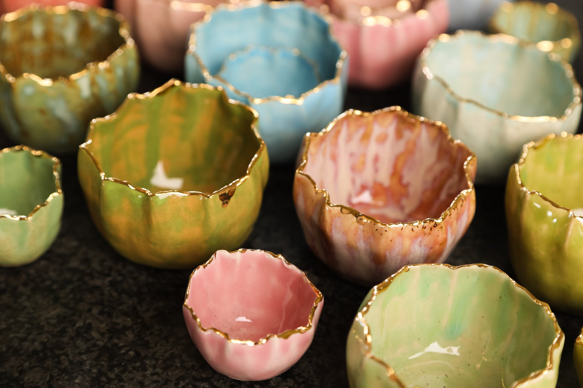Collection of coloured pinch pots
