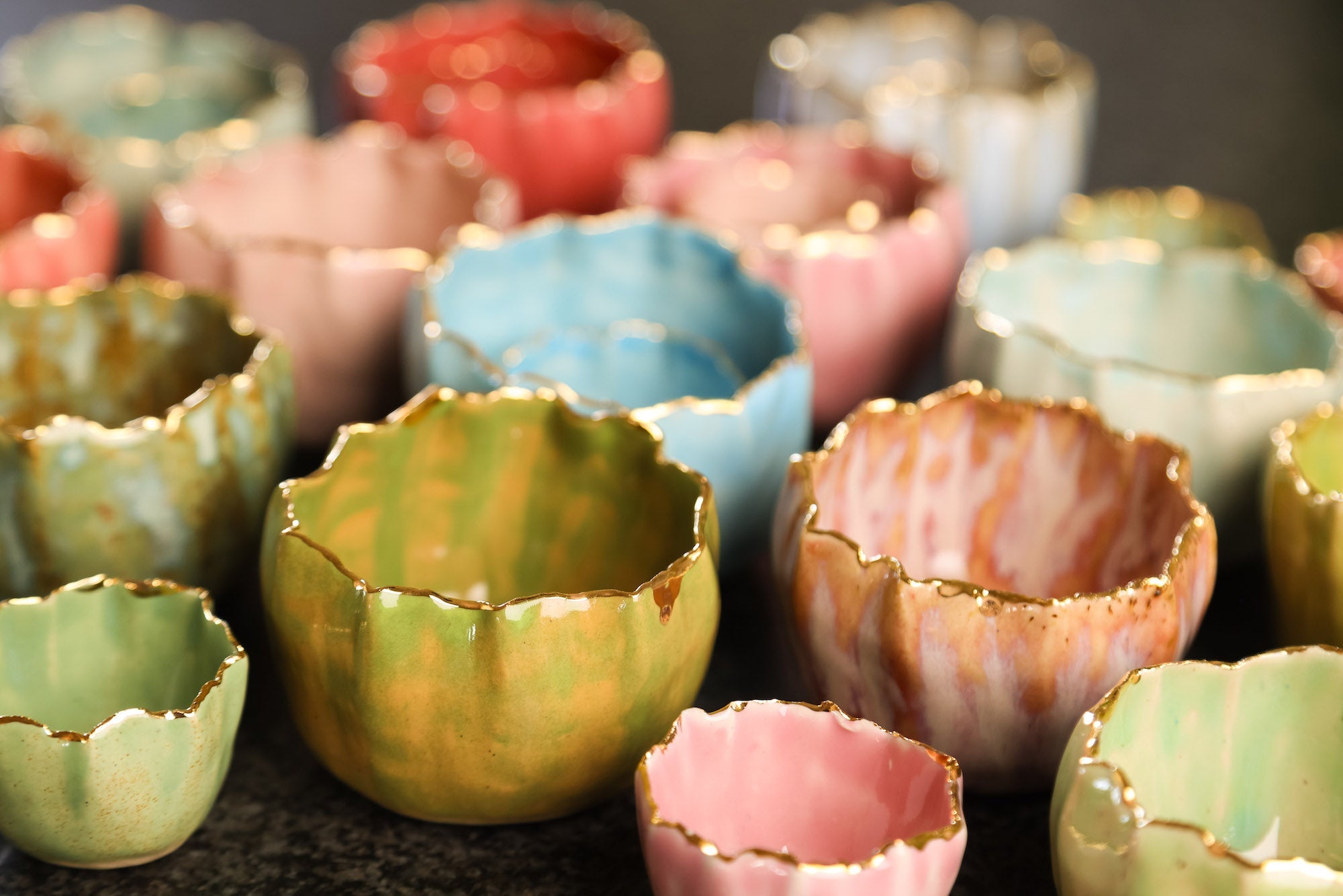 Collection of coloured pinch pots