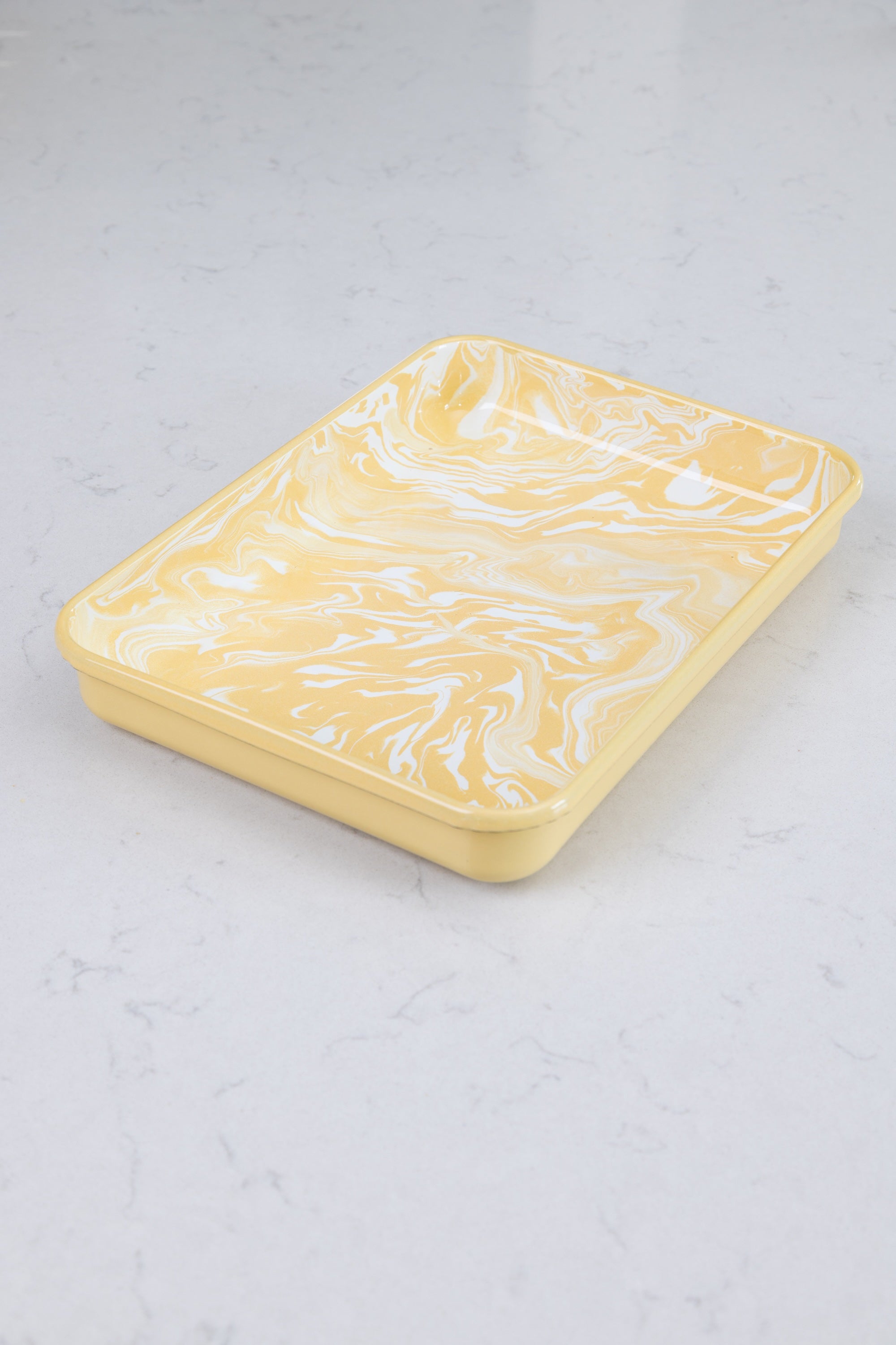 Yellow rectangular dish with white marbled pattern o