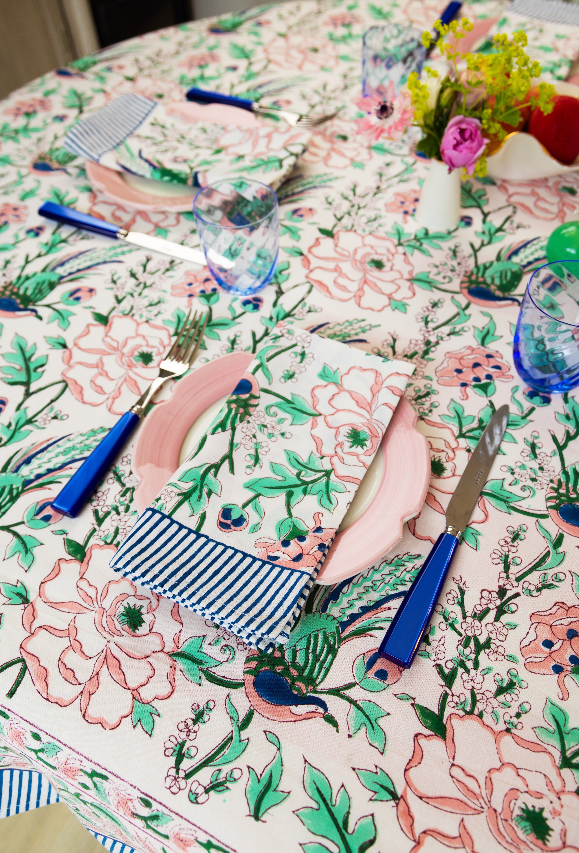 Pink, green and blue tropical print table cloth and napkins
