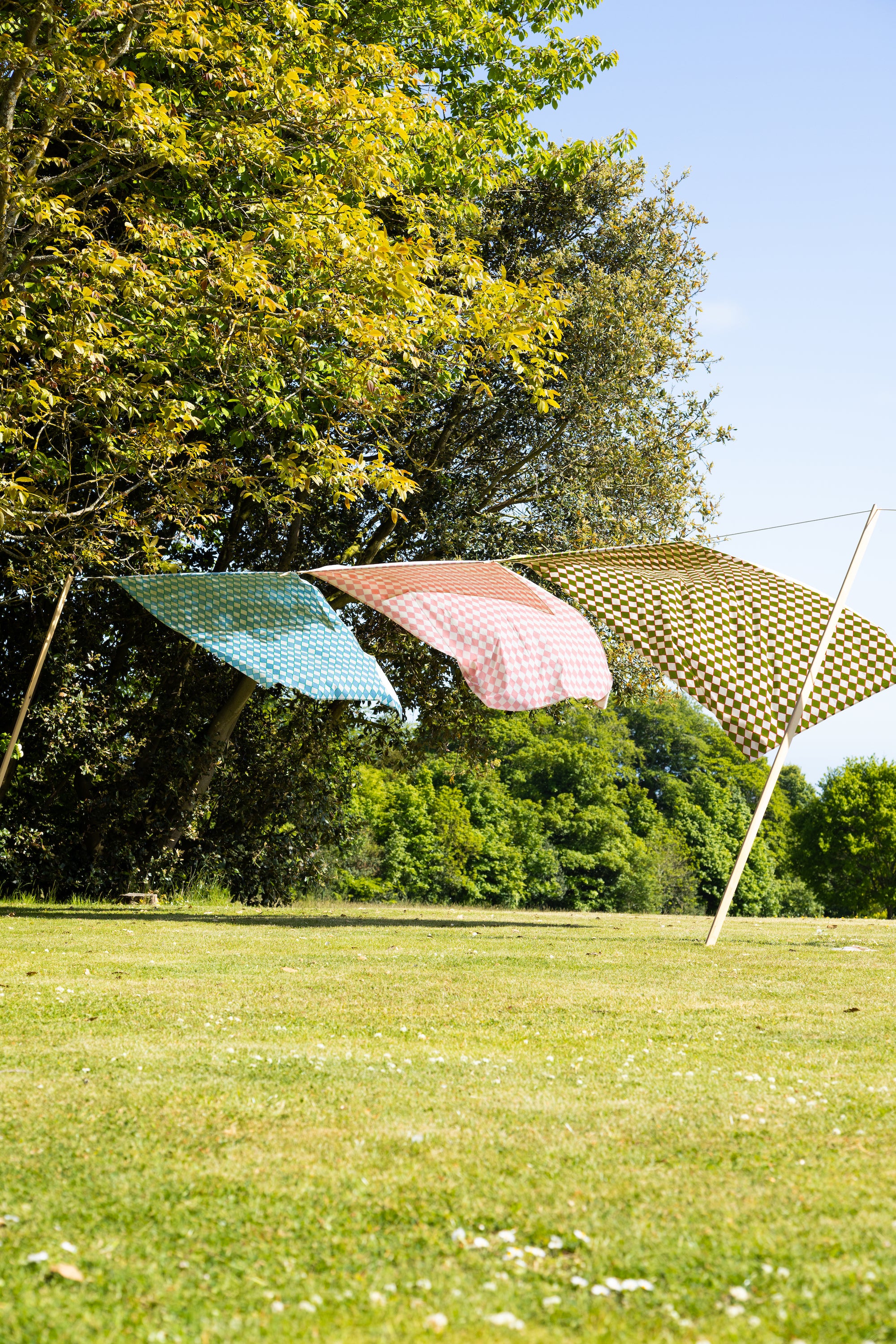 Check print table cloths on washing line
