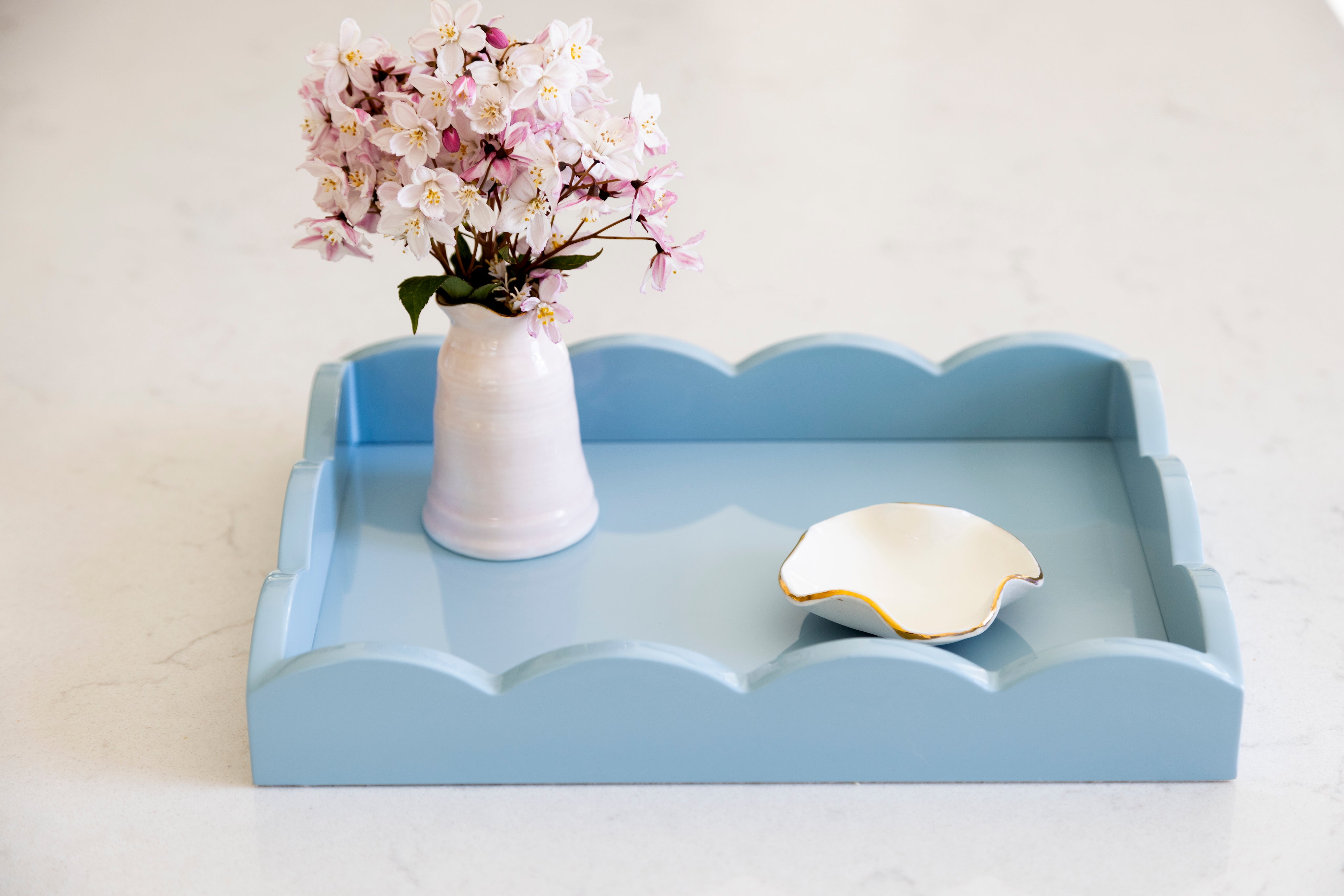 Small denim blue scalloped tray with Joanna ling bud vase and trinket dish