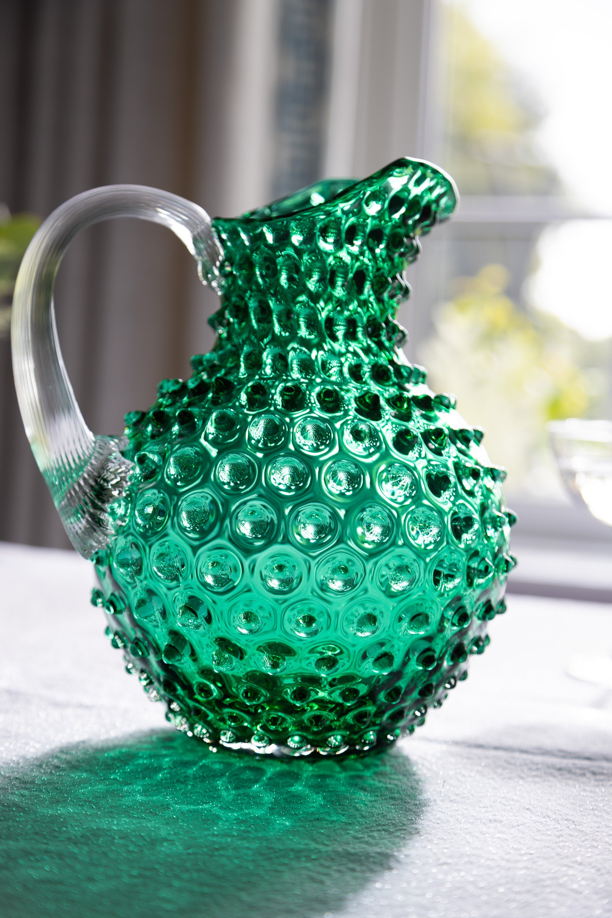 Underlay dark green hobnail glass jug