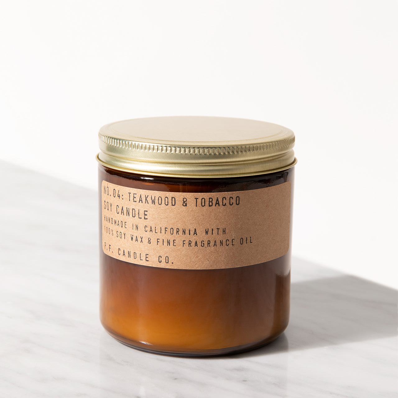 P.F. Candle Co. Scented candle | Teakwood & Tobacco | osski